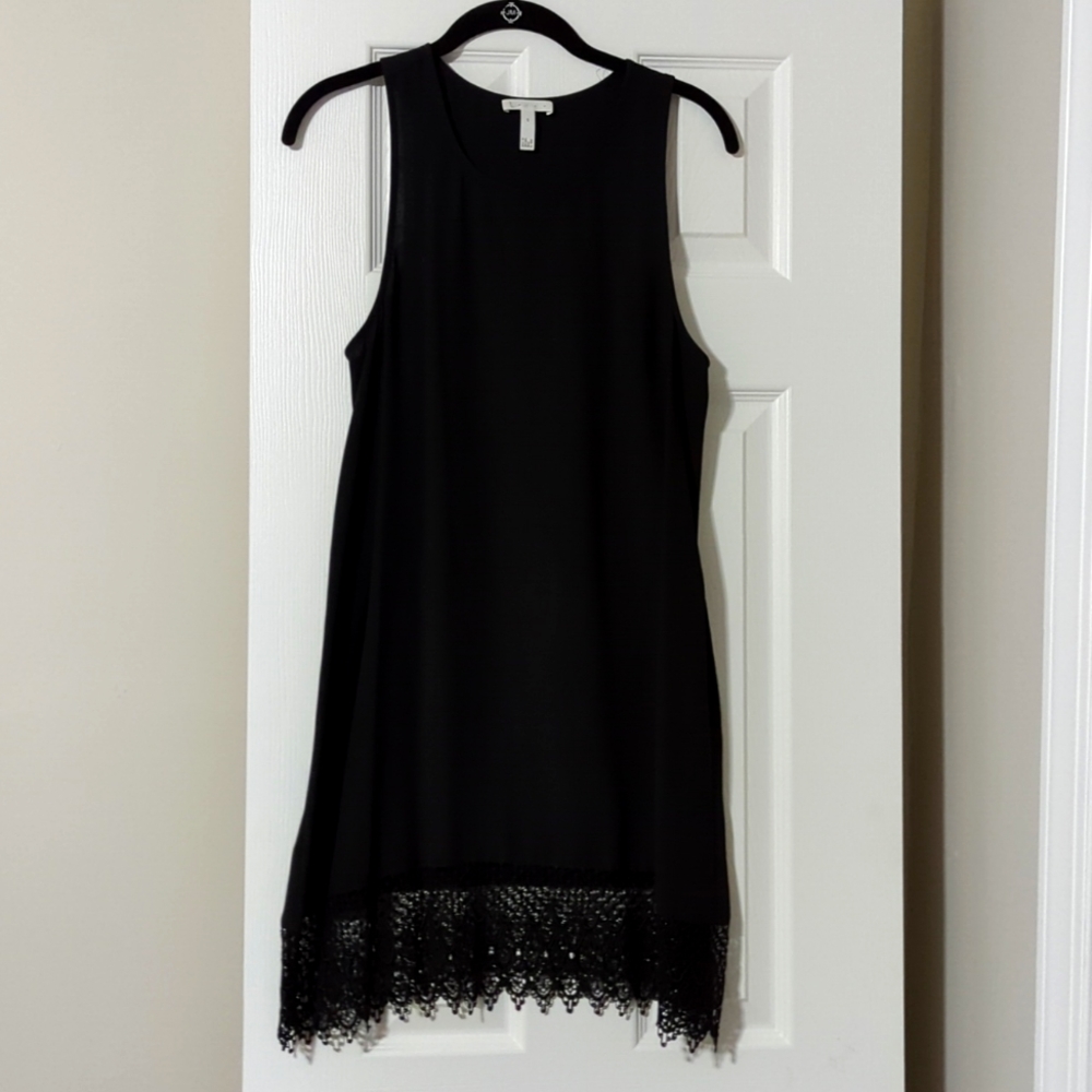 Little black dress with beautiful accents on bottom